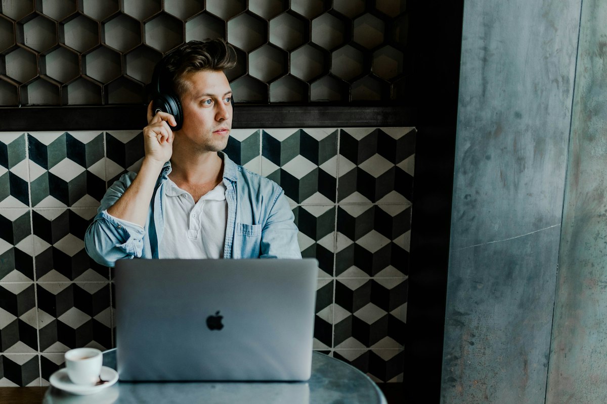 A professional on a phone call at his desk